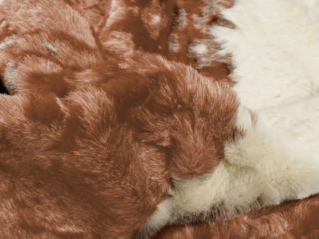 4' X 5' Brown And Ivory Faux Cowhide Animal Print Area Rug