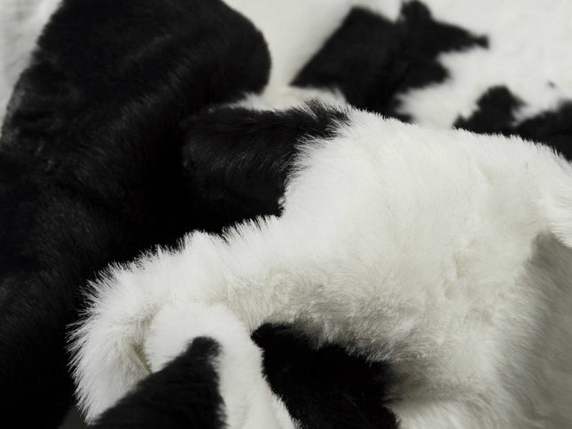 5' X 8' Black And White Cowhide Print Washable Area Rug