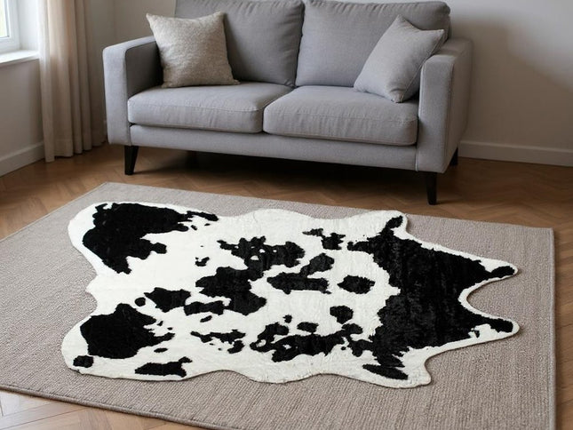 5' X 8' Black And White Cowhide Print Washable Area Rug