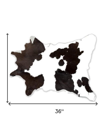 2' X 3' Black And White Cowhide Abstract Hand Woven Area Rug