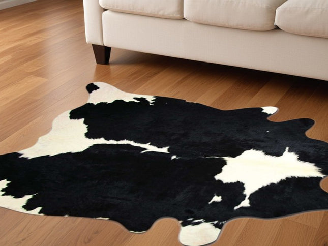 5' X 7' Black And White Cowhide Area Rug