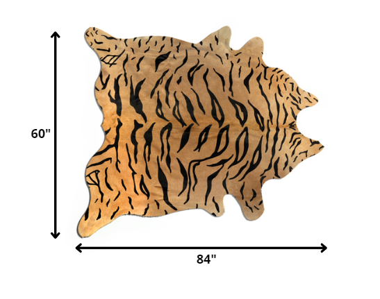 5' X 7' Black And Orange Cowhide Area Rug