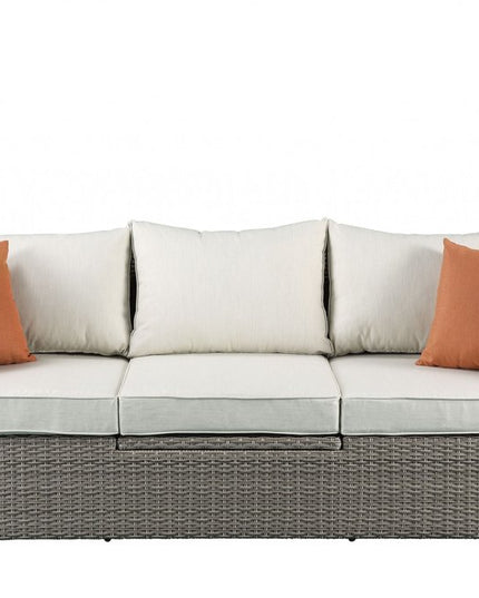 Three Piece Outdoor Gray Wicker Sectional Seating Group with Beige Cushions