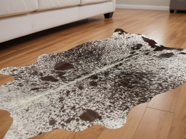 5' X 7' Brown And White Cowhide Area Rug