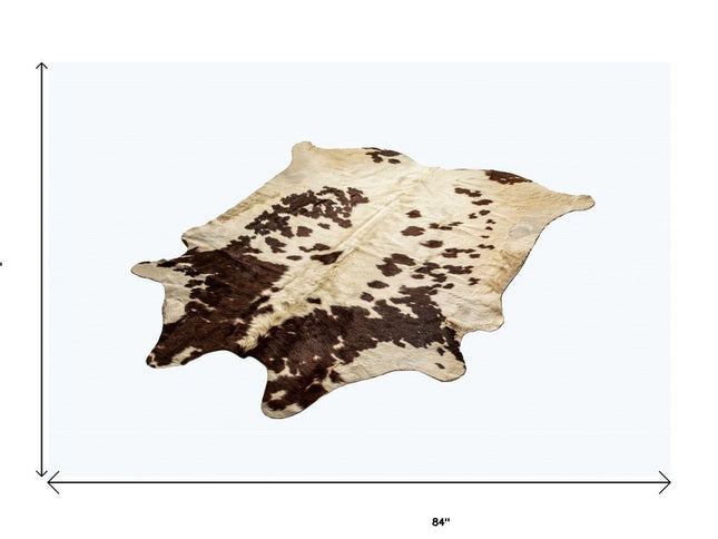 6' X 7' Brown And White Cowhide Cowhide Print Area Rug