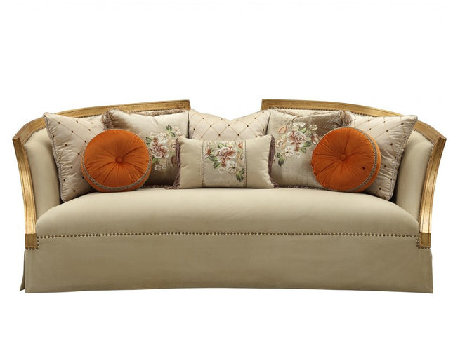 41" Beige Velvet Curved Sofa And Toss Pillows With Natural Legs