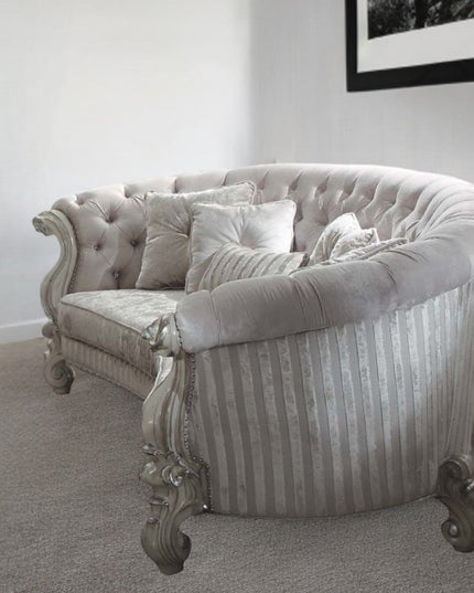 55" Ivory Velvet Curved Floral Sofa And Toss Pillows With Gray Legs