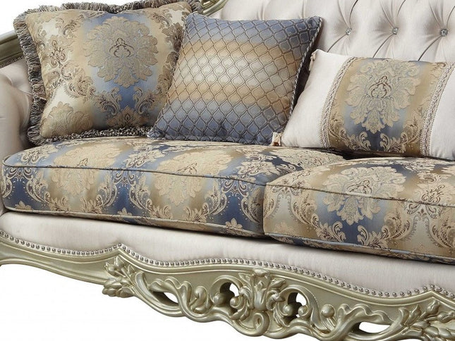 40" Antiqued White Velvet Curved Floral Sofa And Toss Pillows With Champagne Legs