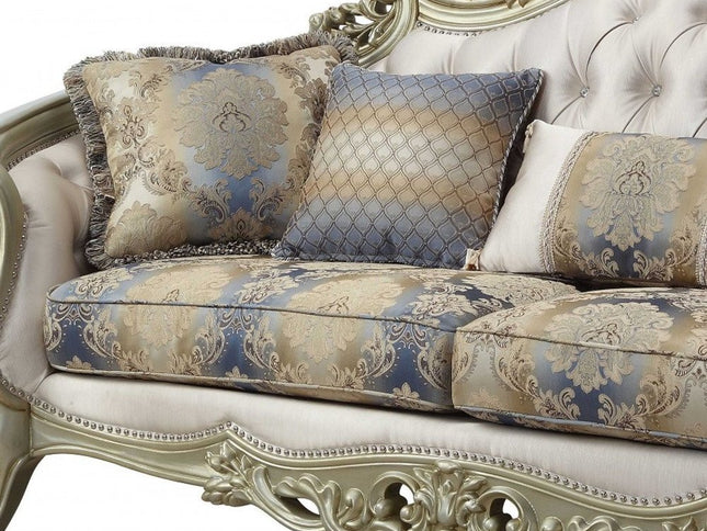 40" Antiqued White Velvet Curved Floral Sofa And Toss Pillows With Champagne Legs