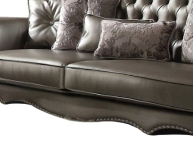 46" Platinum Faux Leather Curved Sofa And Toss Pillows
