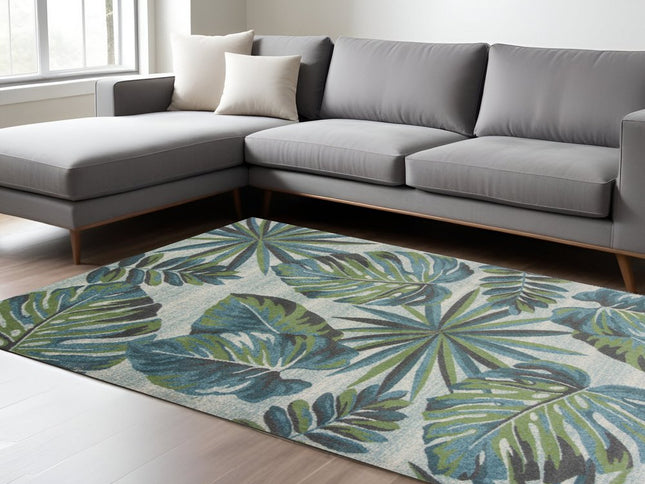 9' X 13' Beige Teal And Green Tropical Botanical Area Rug
