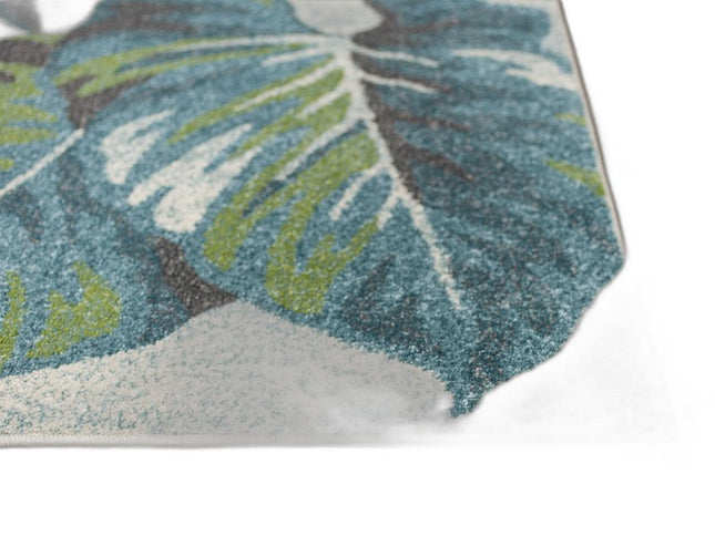 9' X 13' Beige Teal And Green Tropical Botanical Area Rug