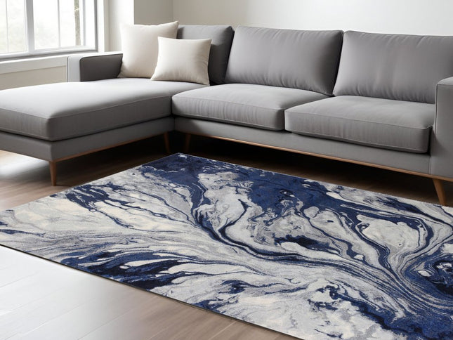 7' X 10' Blue Gray And Ivory Abstract Area Rug