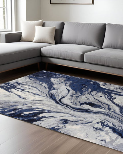 7' X 10' Blue Gray And Ivory Abstract Area Rug