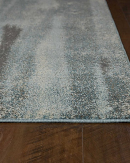 7' X 10' Teal Blue And White Abstract Distressed Area Rug