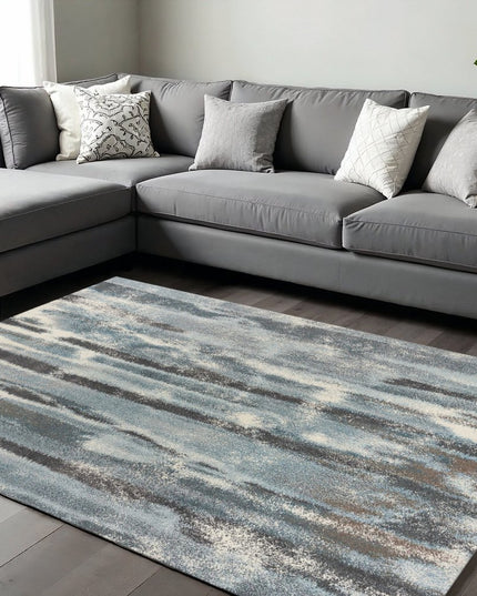 7' X 10' Teal Blue And White Abstract Distressed Area Rug