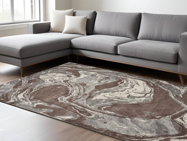 5' X 8' Brown And Ivory Abstract Area Rug