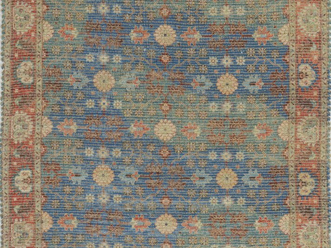 5' X 7' Blue Red And Beige Floral Medallion Hand Woven Distressed Area Rug