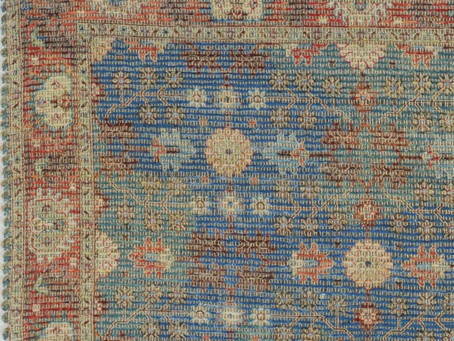 5' X 7' Blue Red And Beige Floral Medallion Hand Woven Distressed Area Rug