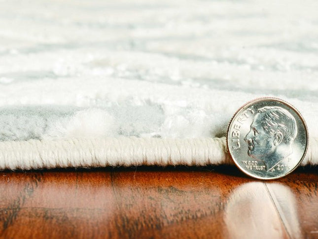 5' X 8' Sand And Light Blue Geometric Area Rug