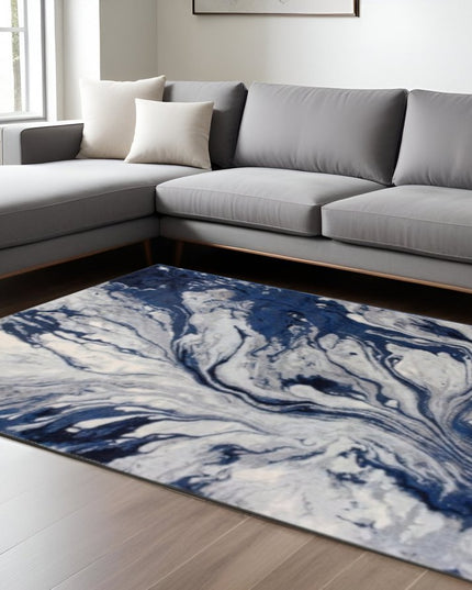 7' X 10' Blue Gray And Ivory Abstract Area Rug