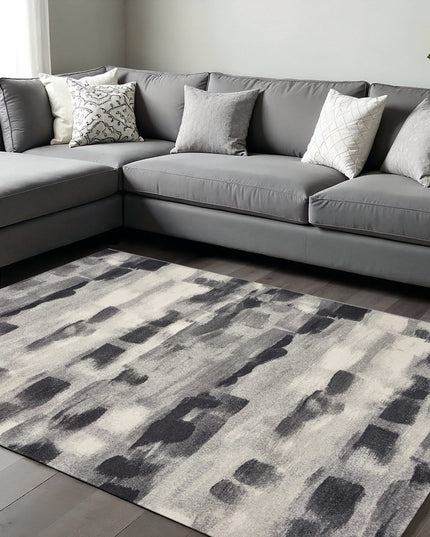 10' X 13' Gray Black And Ivory Abstract Area Rug