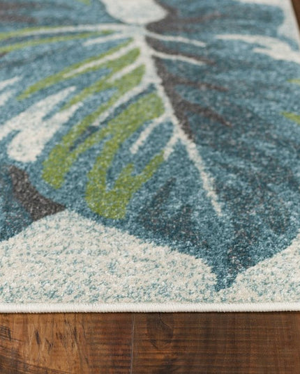 9' X 13' Beige Teal And Green Tropical Botanical Area Rug