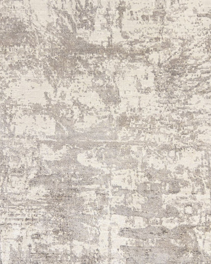 8' X 11' Beige And Ivory Abstract Hand Loomed Area Rug