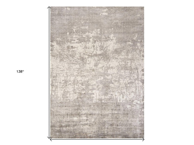 8' X 11' Beige And Ivory Abstract Hand Loomed Area Rug