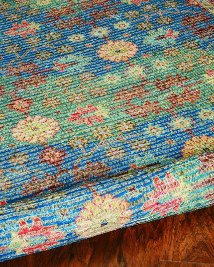 5' X 7' Blue Red And Beige Floral Medallion Hand Woven Distressed Area Rug