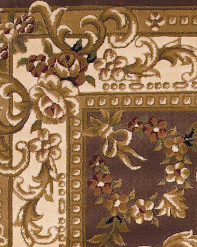 5' X 8' Beige Ivory And Brown Floral Medallion Area Rug