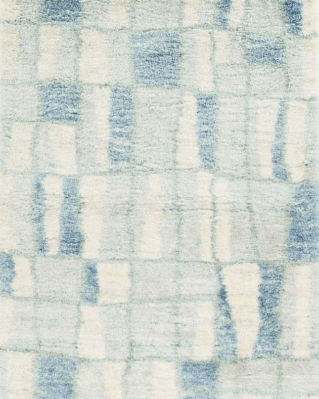 5' X 8' Ivory And Blue Abstract Area Rug
