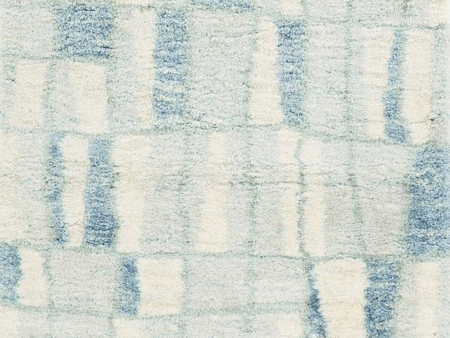 5' X 8' Ivory And Blue Abstract Area Rug