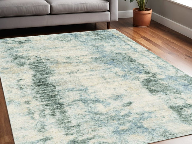 5' X 8' Ivory And Blue Abstract Area Rug