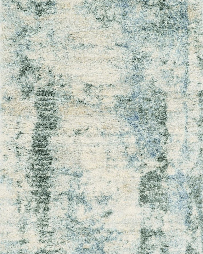5' X 8' Ivory And Blue Abstract Area Rug