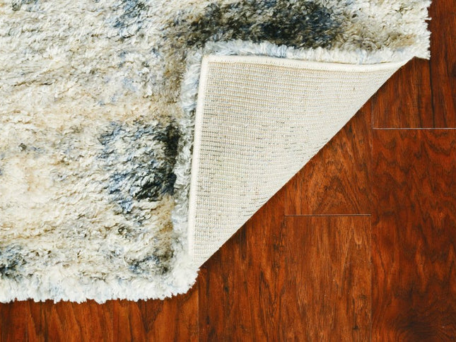 5' X 8' Ivory And Blue Abstract Area Rug