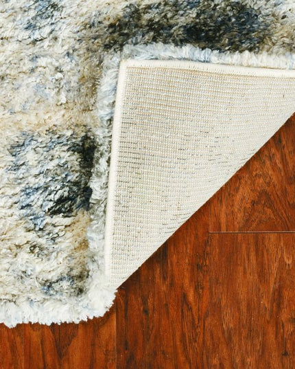 5' X 8' Ivory And Blue Abstract Area Rug