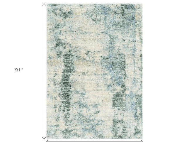 5' X 8' Ivory And Blue Abstract Area Rug