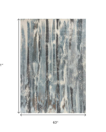 7' X 10' Teal Blue And White Abstract Distressed Area Rug
