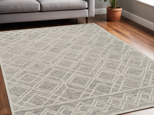 5' X 7' Sand Beige And Ivory Wool Geometric Hand Hooked Area Rug