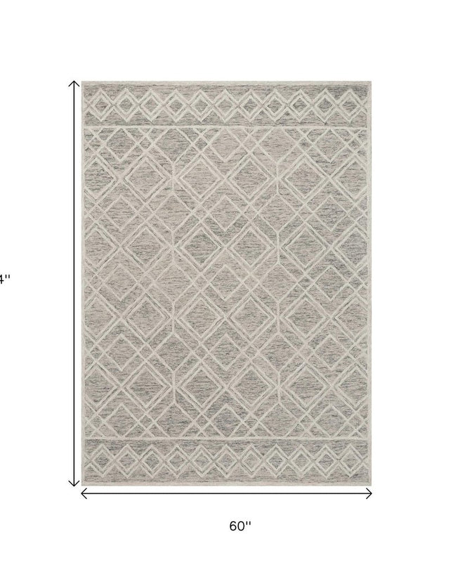 5' X 7' Sand Beige And Ivory Wool Geometric Hand Hooked Area Rug