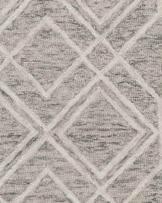 5' X 7' Sand Beige And Ivory Wool Geometric Hand Hooked Area Rug