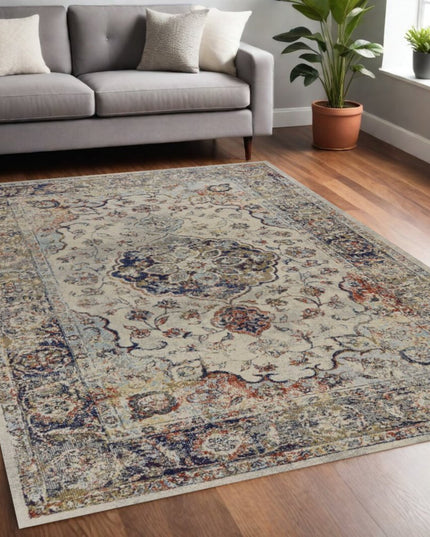 5' X 8' Ivory Blue And Orange Medallion Area Rug