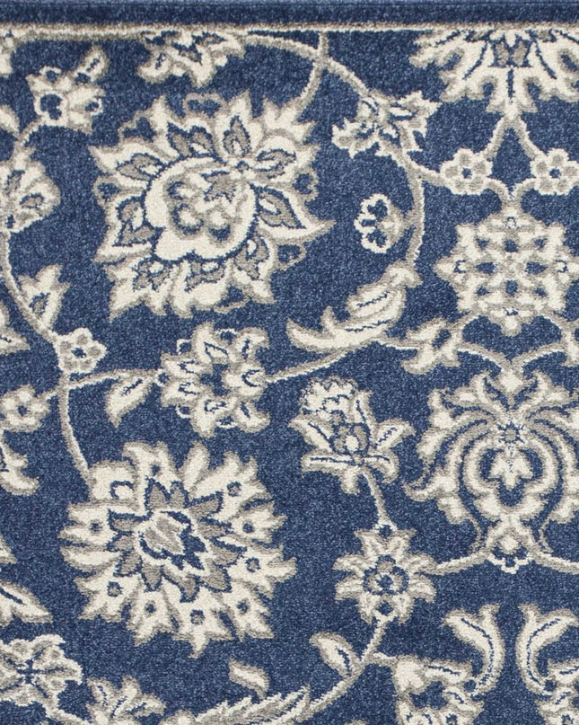 7' X 9' Blue And Ivory Floral Medallion Area Rug