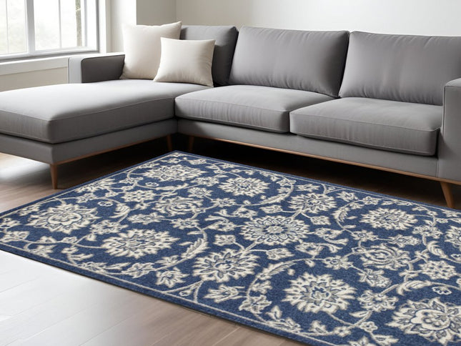 7' X 9' Blue And Ivory Floral Medallion Area Rug