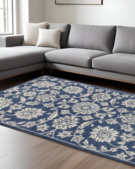 7' X 9' Blue And Ivory Floral Medallion Area Rug