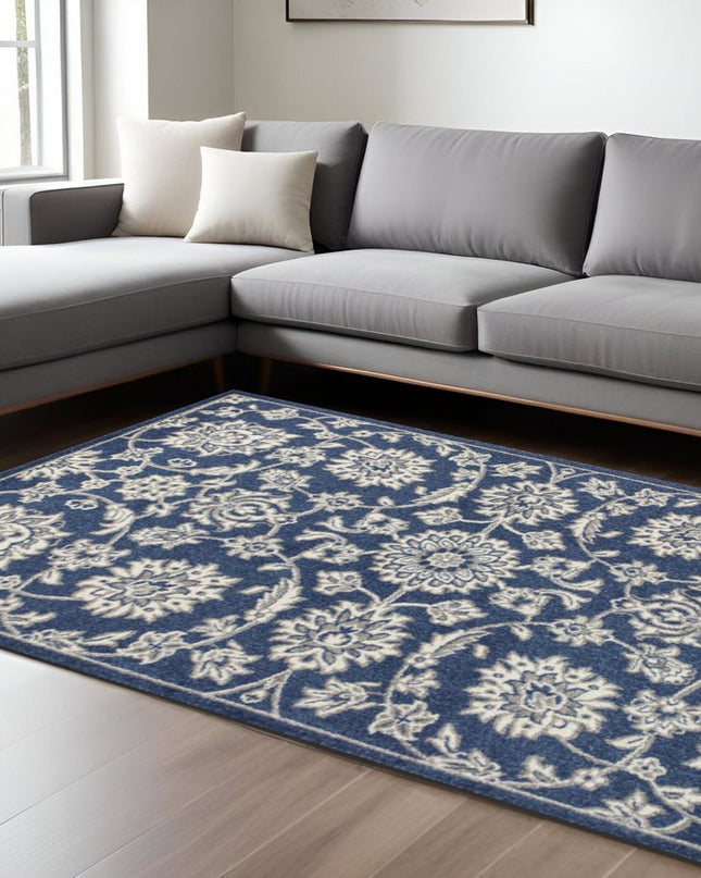 7' X 9' Blue And Ivory Floral Medallion Area Rug