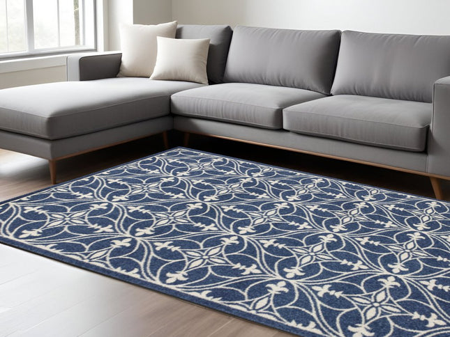 7' X 9' Blue And Ivory Floral Medallion Area Rug