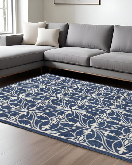 7' X 9' Blue And Ivory Floral Medallion Area Rug