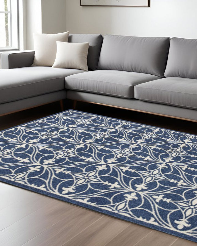 7' X 9' Blue And Ivory Floral Medallion Area Rug